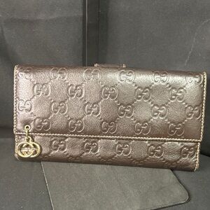 Gucci Dark Brown Embossed Leather Wallet